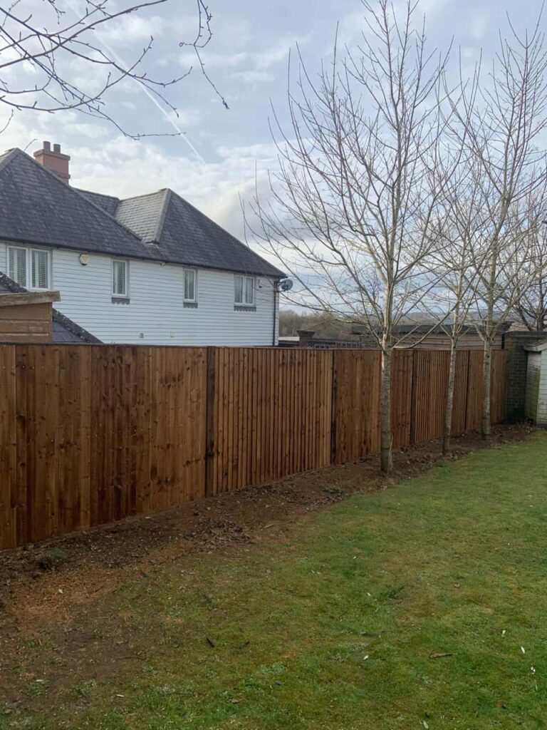 This is a photo of feather edge fencing installed in a residential properties garden by Fast Fix Fencing Sheppey