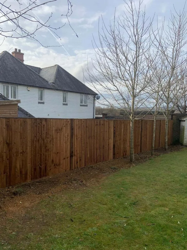 This is a photo of feather edge fencing installed in a residential properties garden by Fast Fix Fencing Sheppey