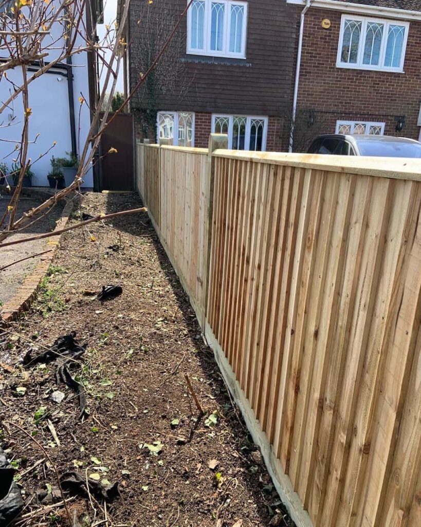 This is a photo of feather edge fencing installed in a residential property by Fast Fix Fencing Sheppey
